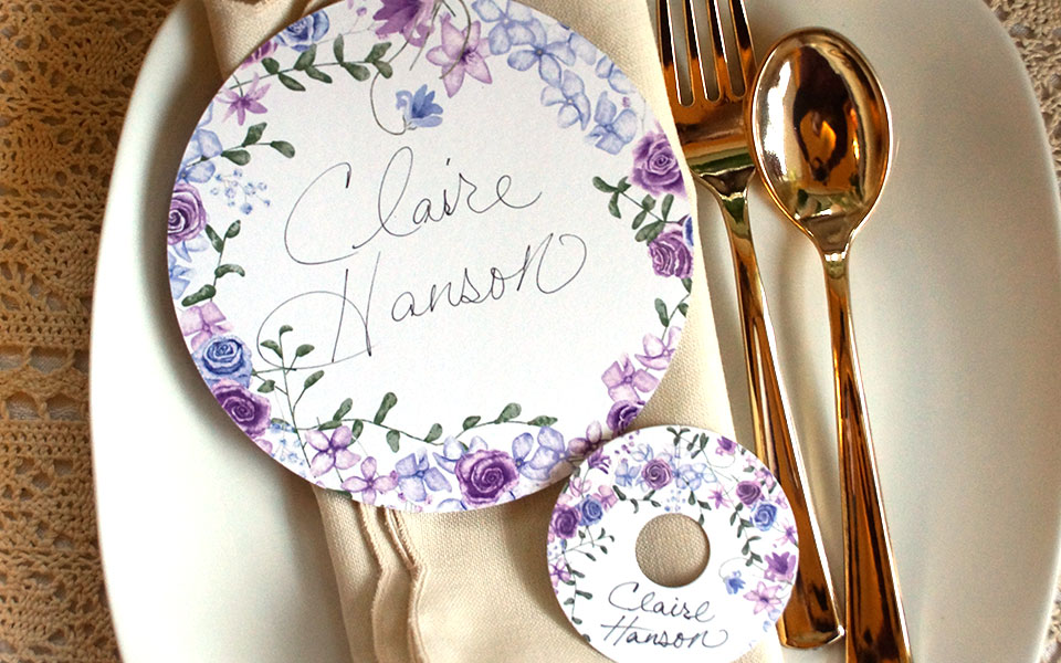 purple and blue wedding reception name place cards